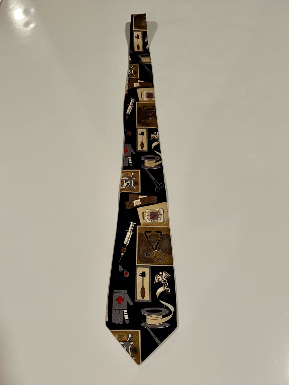 City One Men's Blue/Black Neck Tie with Gold Medical Motif